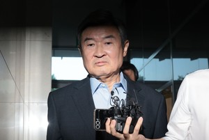 Ex-spy chief summoned in Marine death probe